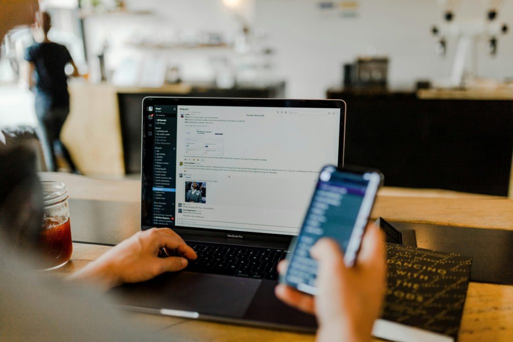 A small business owner using a laptop to set up a Facebook advertising campaign, demonstrating the ease of creating ads to target specific audiences.