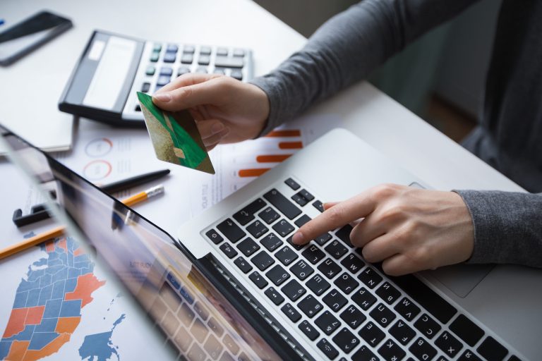 cropped-view-manager-making-online-payment-min-min
